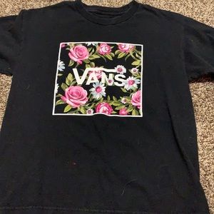 This is a vans shirt that is black with roses!